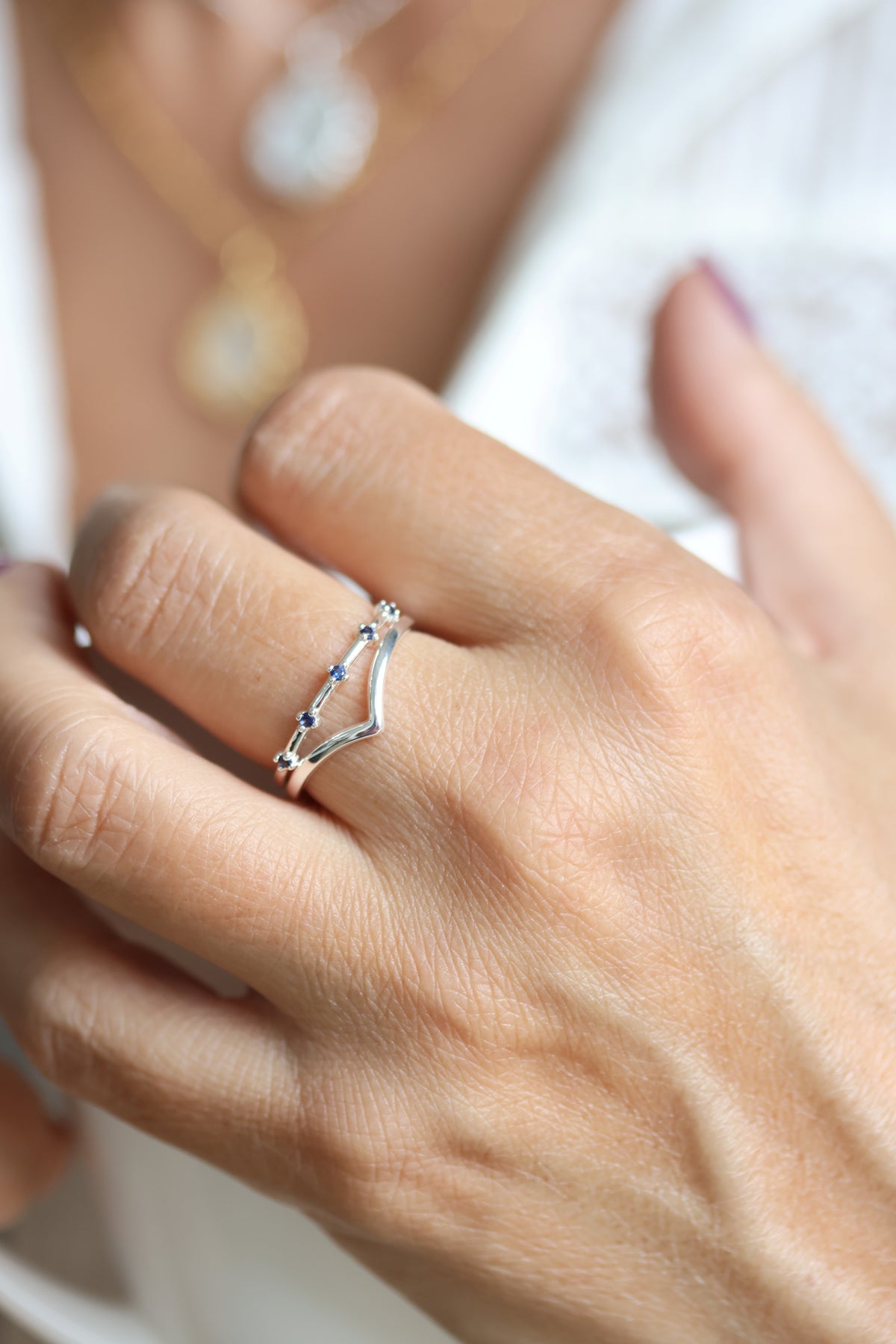Sapphire and wishbone ring in sterling silver