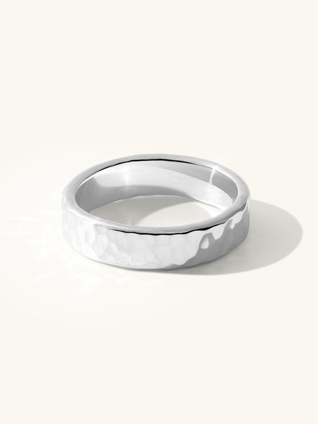 Chunky hammered ring in Sterling silver. Great as a thumb ring or part of your silver stack.