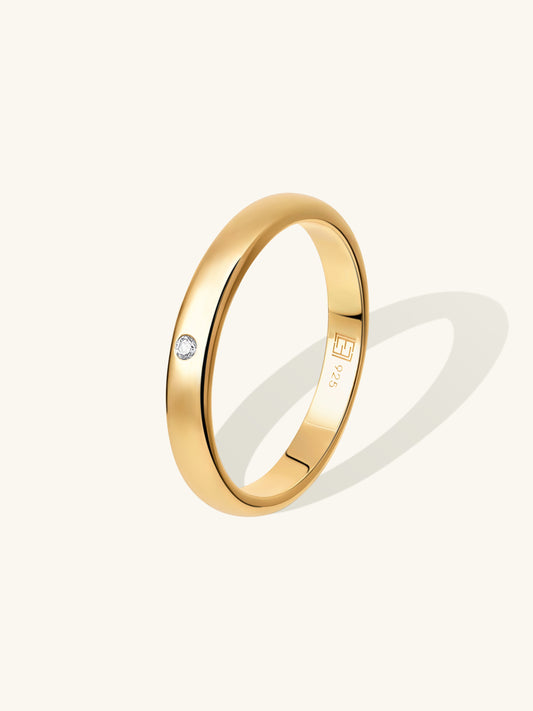 Classic lab-grown diamond band in 14ct Gold Vermeil. Featuring a solitaire diamond. Fastastic as a jewellery staple.