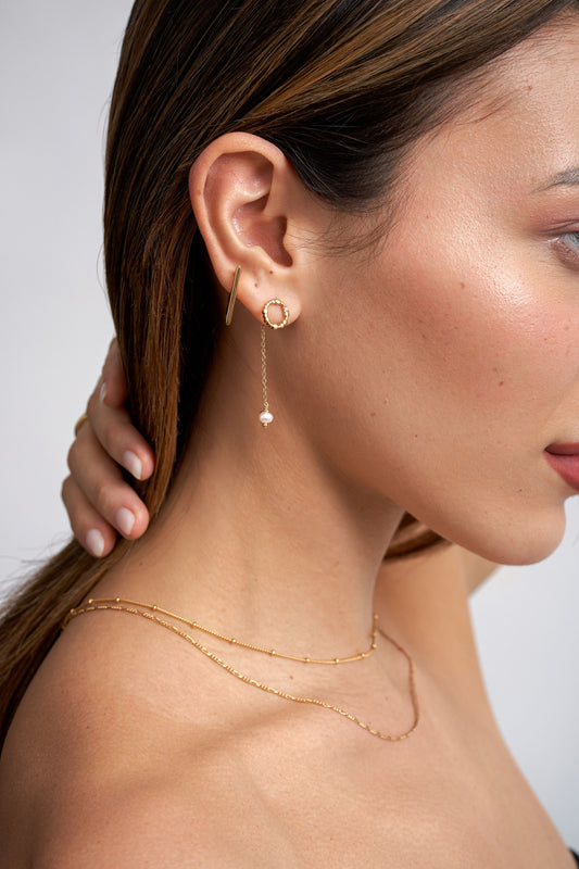 Gold vermeil stud earring with lab grown diamond, pearl earring charm and triangle hoop earring. 