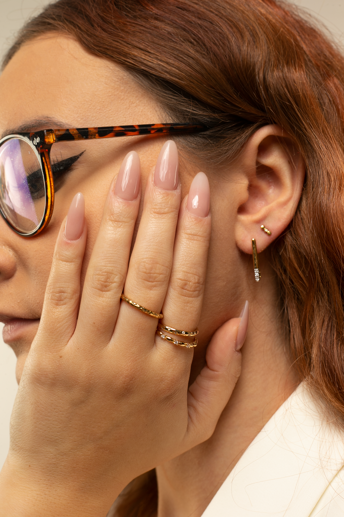 Girl wearing Diamond Sparkle, Grace and Shimmer rings in gold vermeil