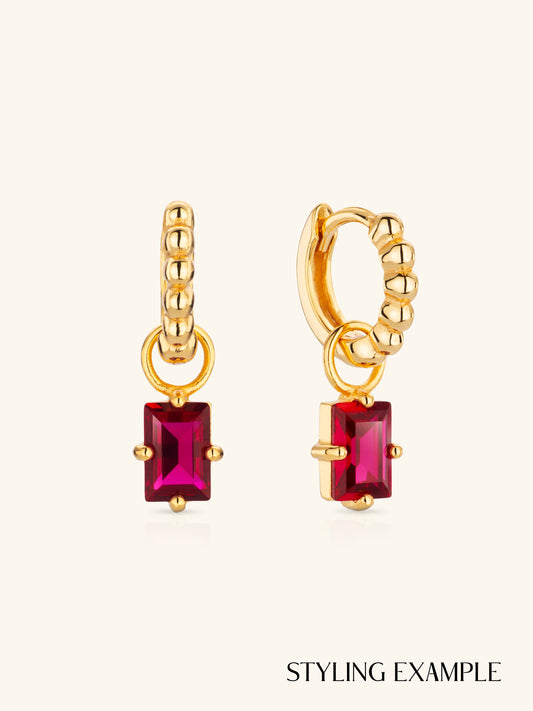 Baguette Ruby Charm shown on Beaded Huggie Hoops Gold Vermeil