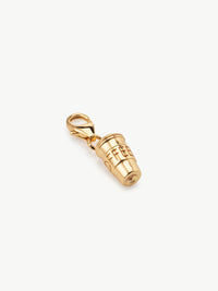 Coffee cup charm in gold laying flat