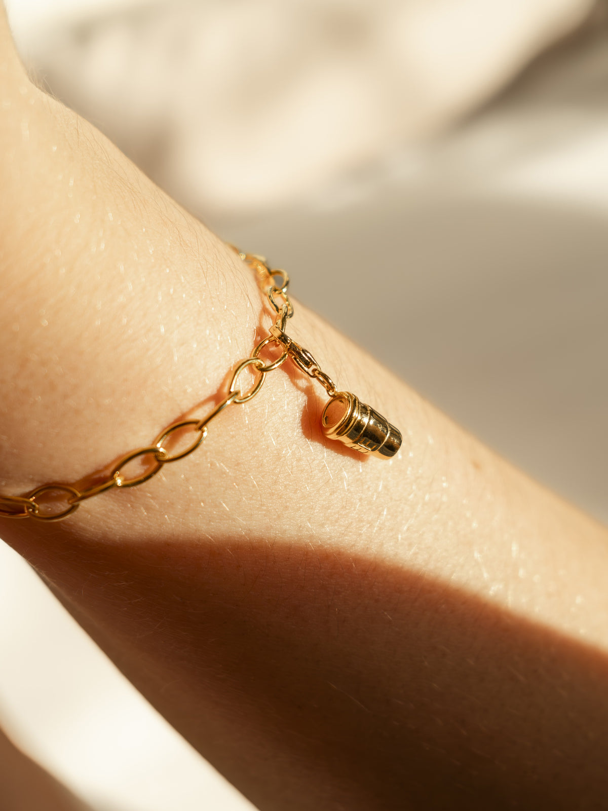 Coffee cup charm on bracelet  in gold