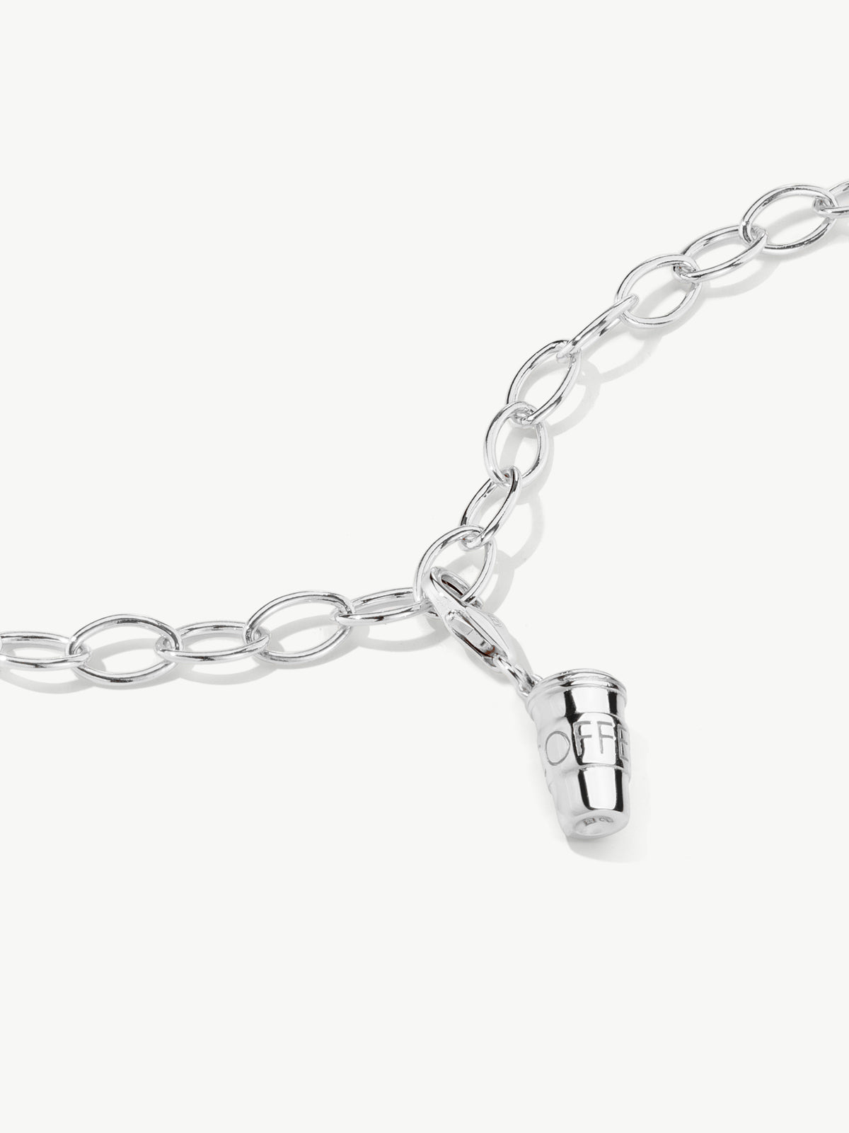 Coffee cup charm on bracelet in silver different angle