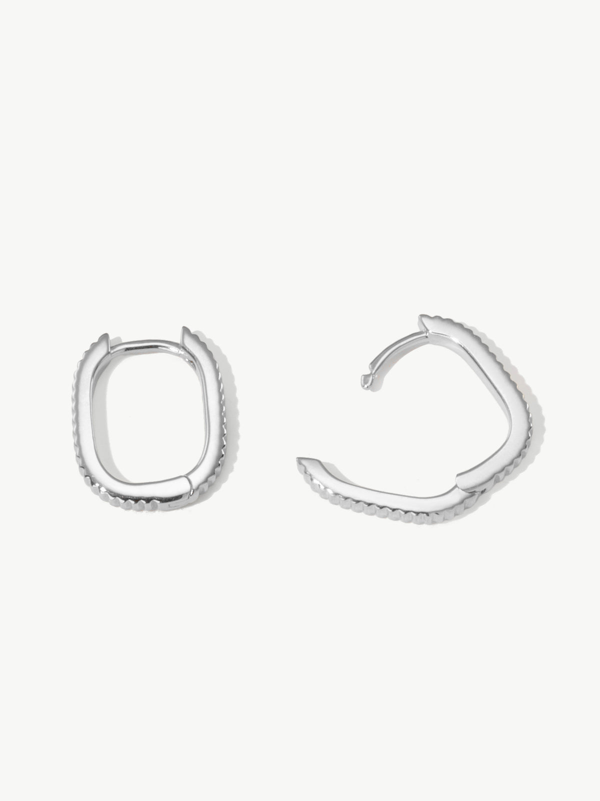 Textured hinged hoop earrings in sterling silver