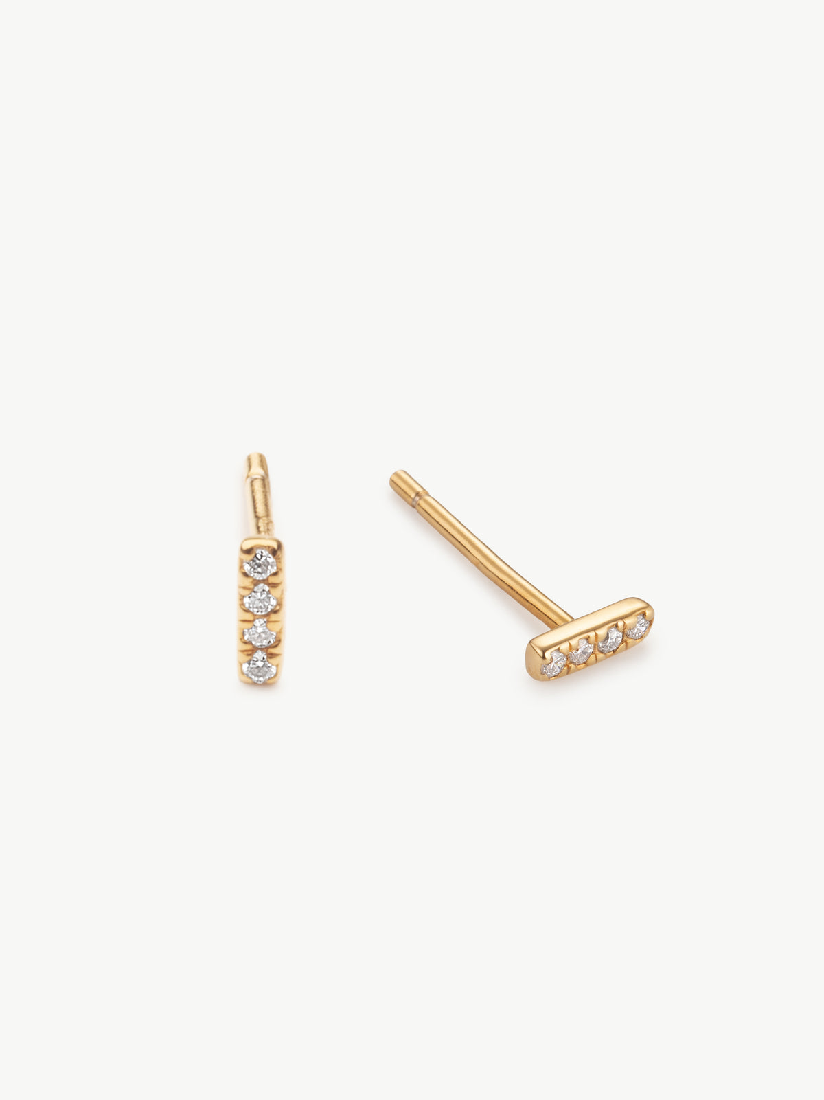 Dainty diamond bar studs in gold vermeil