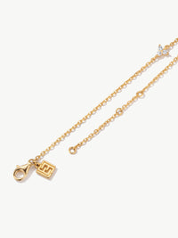 lab grown diamond Trinity Bracelet in gold with L'ERA logo tag