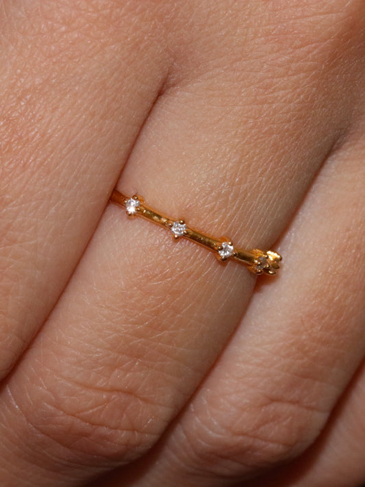 Astra diamond ring on ladies hand