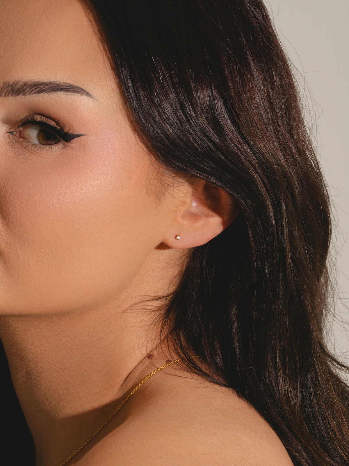 18ct gold vermeil lab grown diamond pendant and stud set mini studs on model