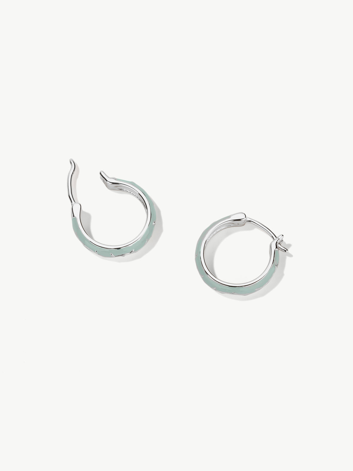 Pair of sterling silver Ophelia enamel hoop earrings with nature detail side shot