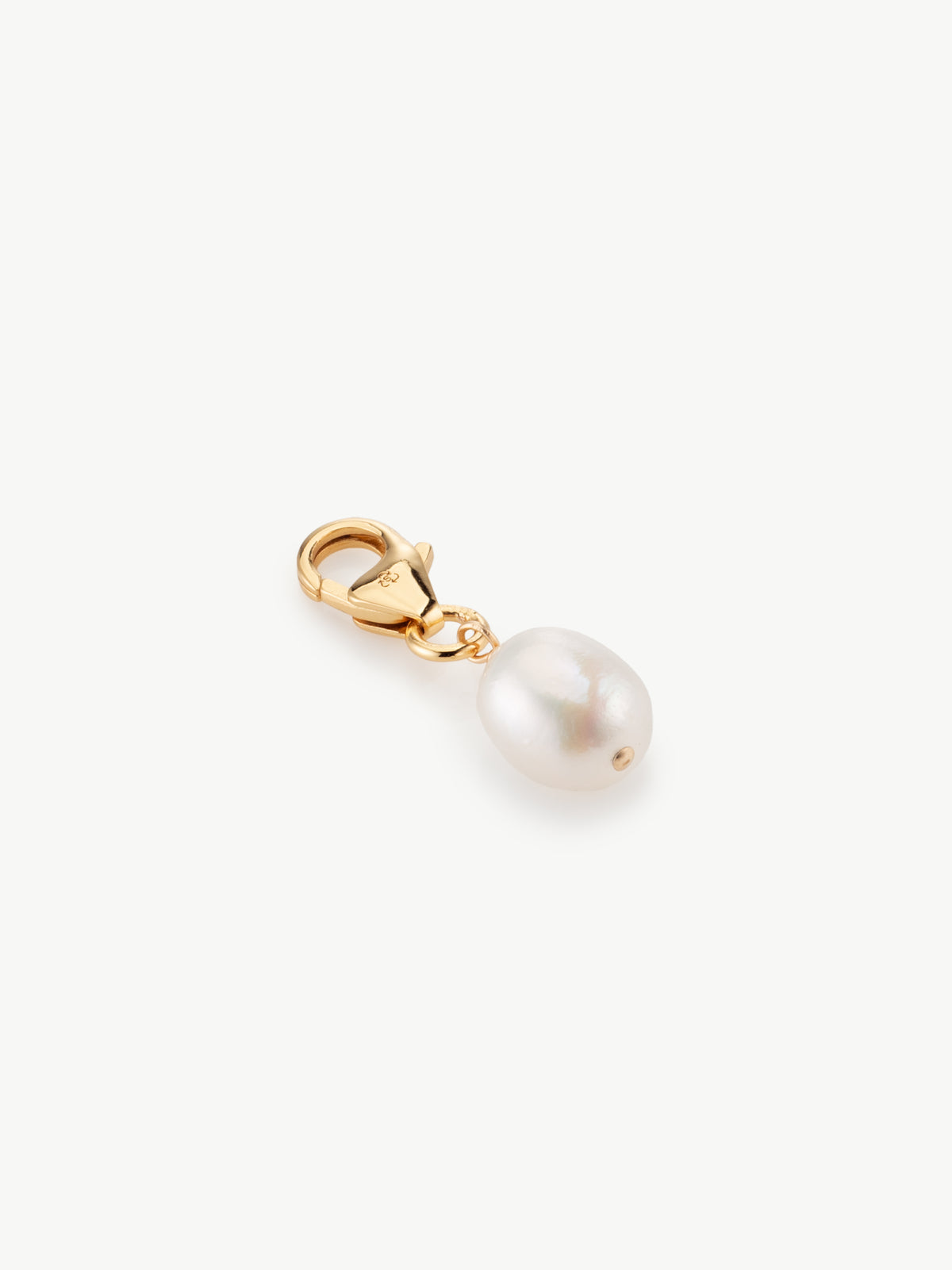 Baroque Pearl bracelet charm in gold vermeil laying flat