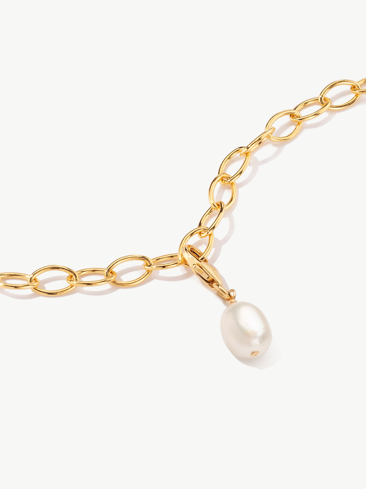 Baroque Pearl charm on bracelet in gold vermeil