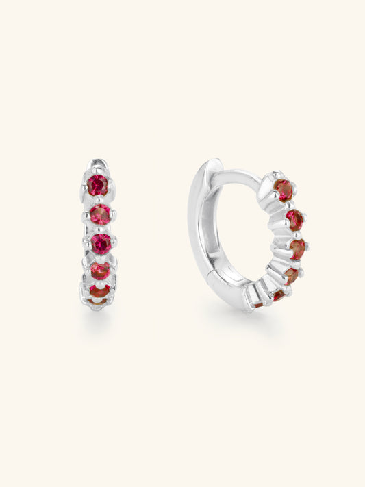 Ruby huggie hoops in Sterling Silver