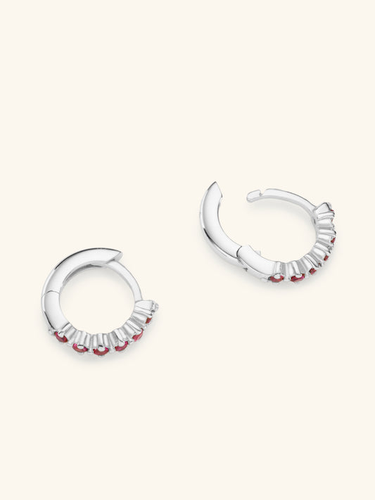 Ruby huggie hoops in Sterling Silver