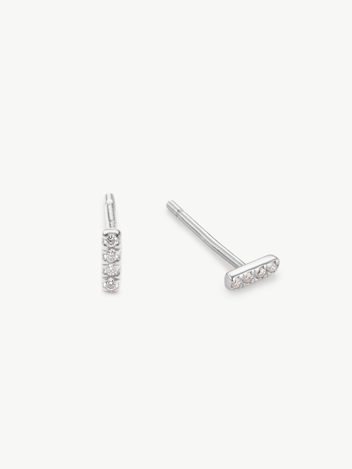 Dainty diamond bar studs in sterling silver