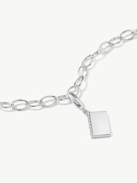 enamel book charm on bracelet in silver