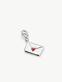 enamel letter charm with red heart in silver laying flat