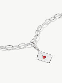 enamel letter charm with red heart on bracelet in silver