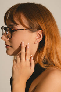 eternity ring in sterling silver with lab grown diamonds on model