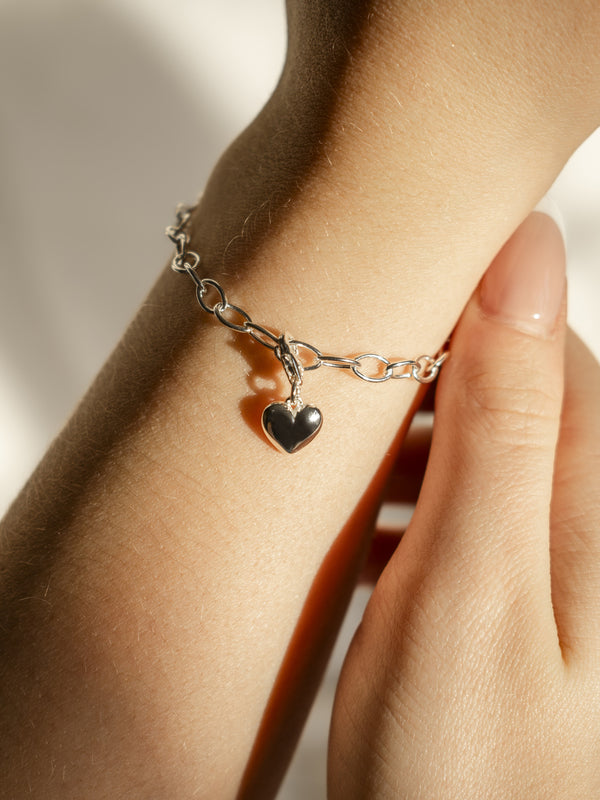 heart charm on Storia charm bracelet in silver
