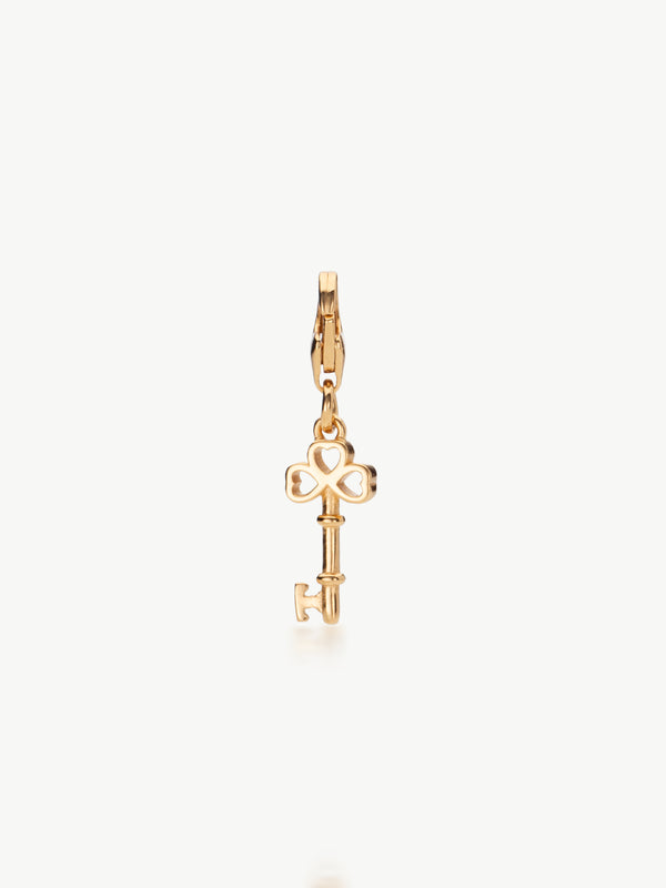 key charm in gold