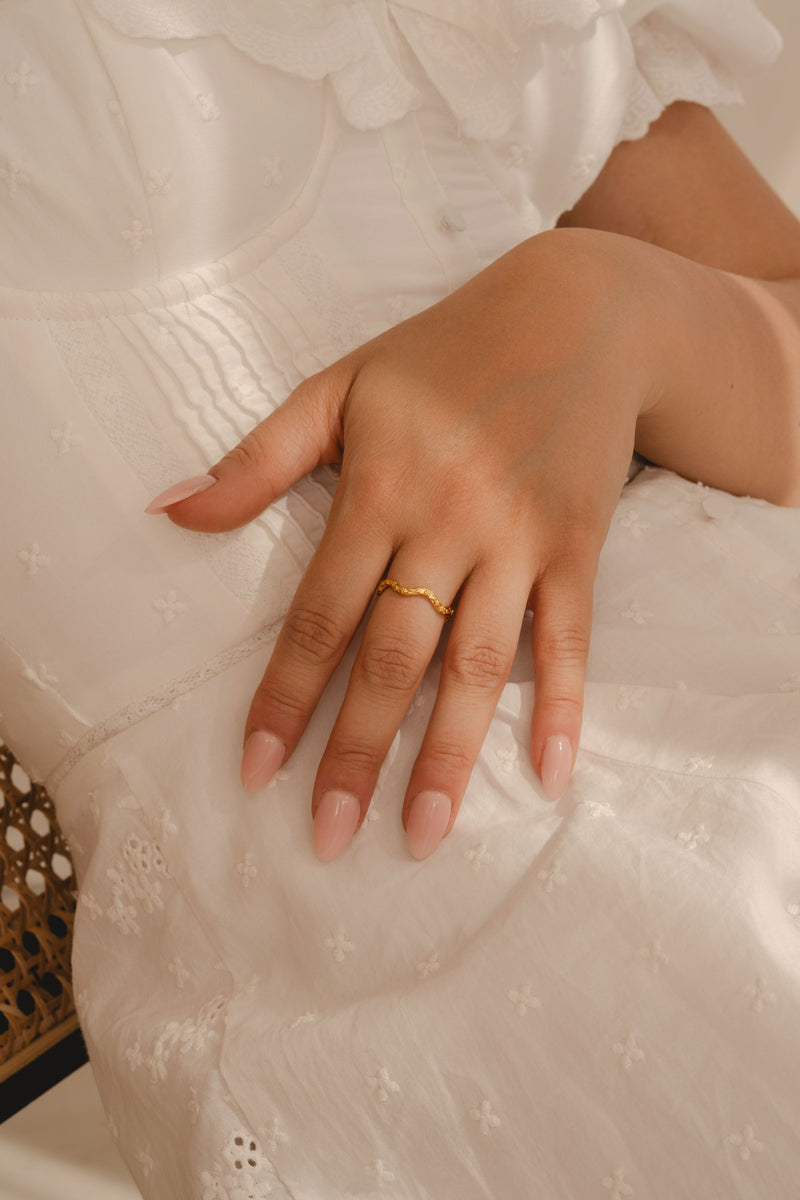 model wearing Wave floral ring gold vermeil front
