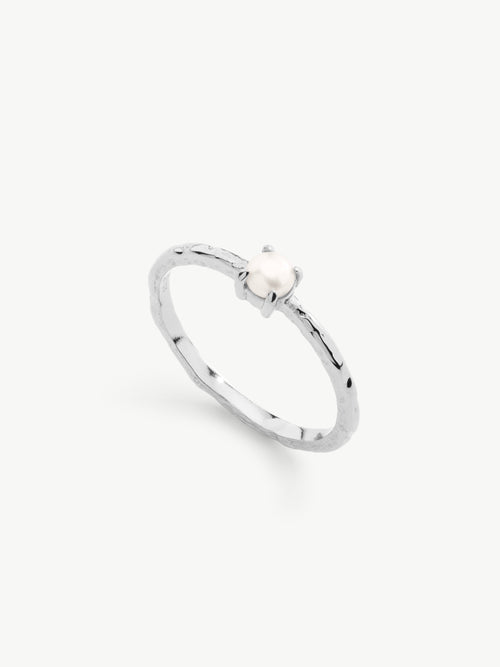 Claw set pearl ring in silver