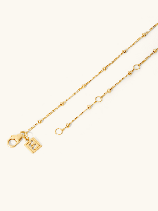 Pretty gold vermeil satellite chain with L'ERA logo tag. L'ERA Jewellery