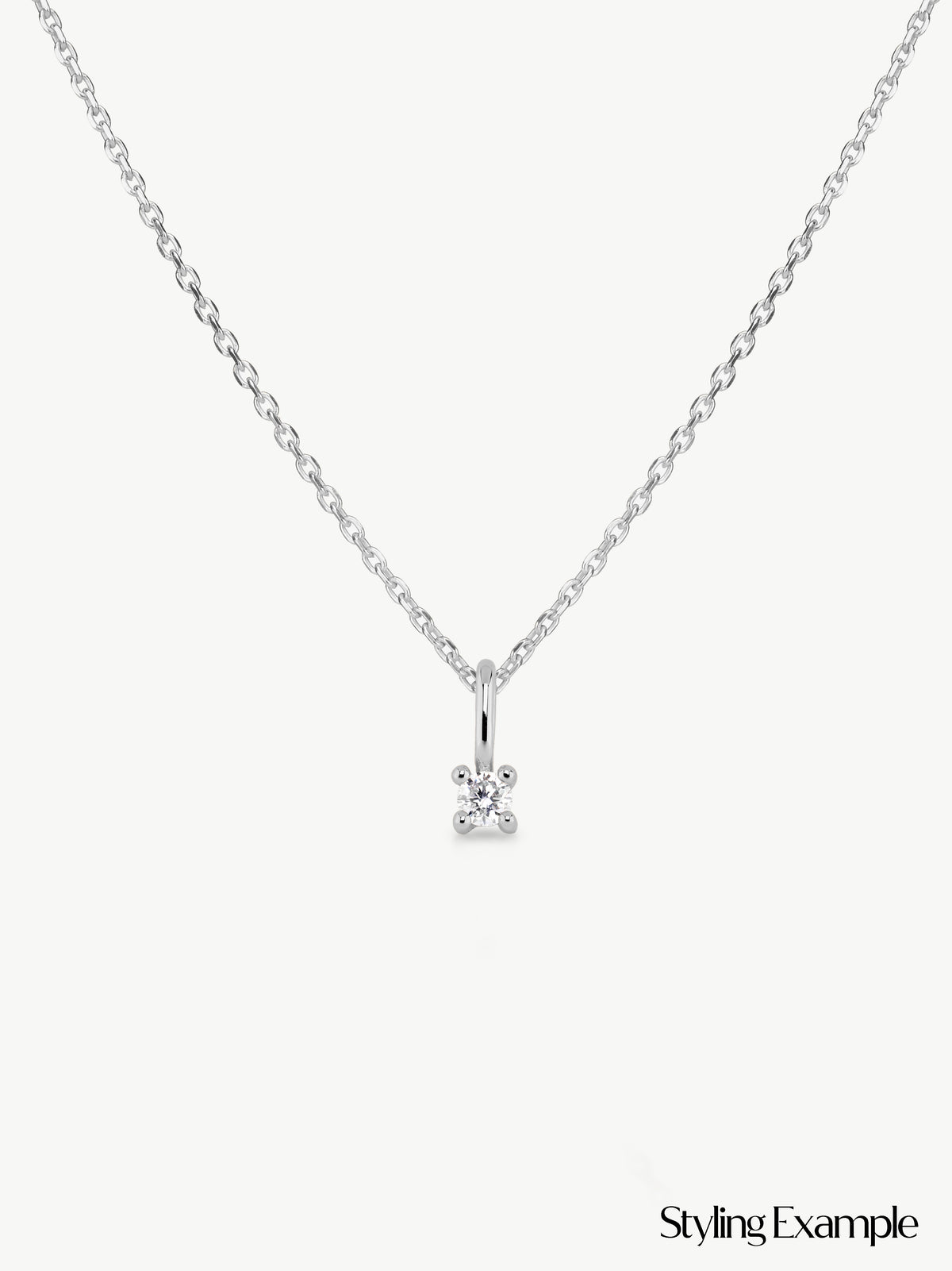 single diamond pendant on chain in sterling silver different angle